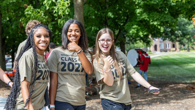 Three students smiling for the camera with shirts that say Bridgewater College Class of 2026